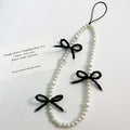 Elegant Pearl🦪& Black Beaded Bow🎀Phone Charm.