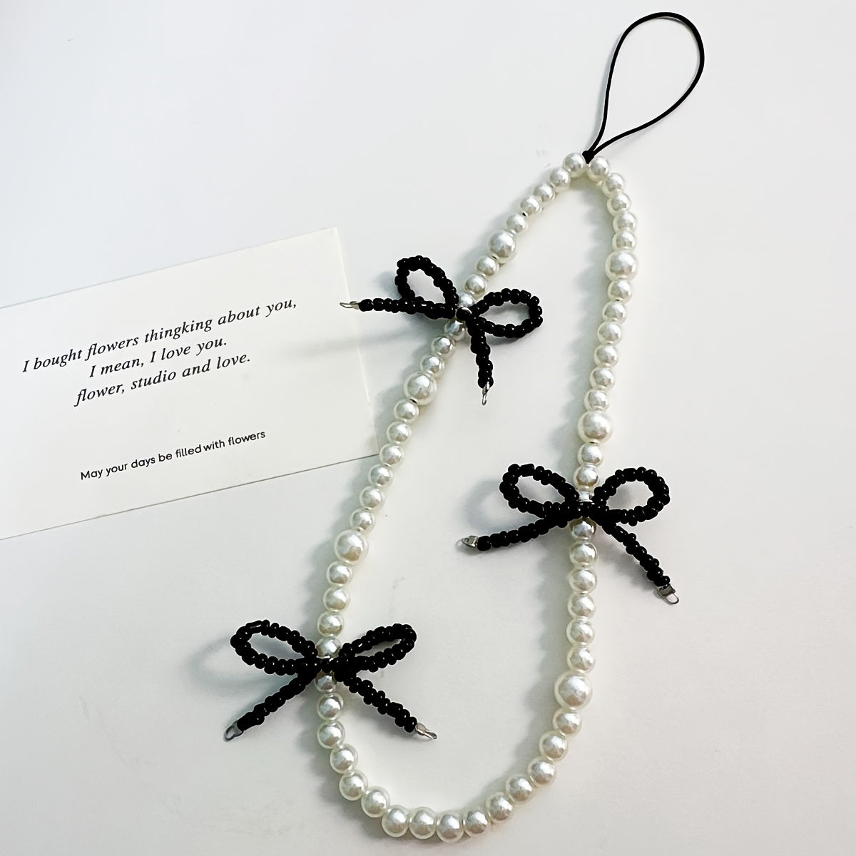 Elegant Pearl🦪& Black Beaded Bow🎀Phone Charm.